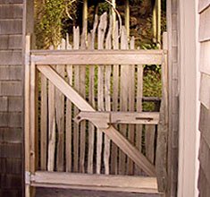 Split cedar gate with copper tube latch